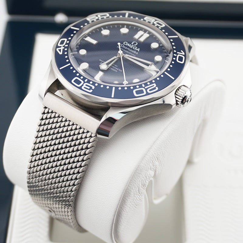 Omega Seamaster Diver 300M James Bond 60th Anniversary Watch with a laser-engraved blue wave dial