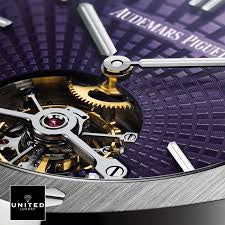 Audemars Piguet Royal Oak Tourbillon Extra-Thin features a unique purple dial with a "Tapisserie Evolutive" sunburst pattern.