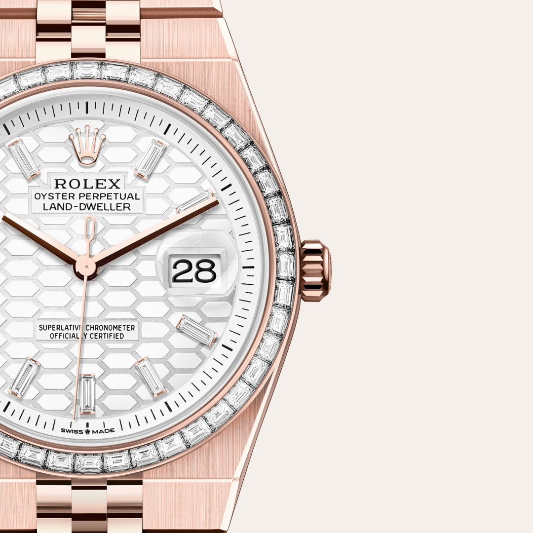 Rolex Land-Dweller watch features a distinctive white honeycomb-motif dial and an Eve-rose gold case