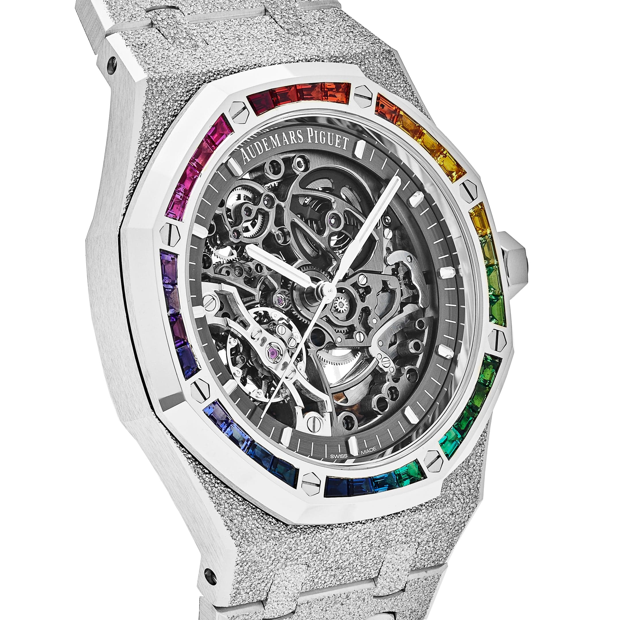 Audemars Piguet Royal Oak Double Balance Wheel Open-worked features a frosted white gold finish and a bezel set with rainbow-colored baguette-cut sapphires