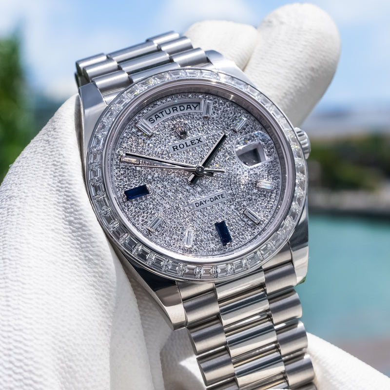 Rolex Day-Date 40 wristwatch, specifically reference 228396TBR, features a platinum case and a diamond-paved dial