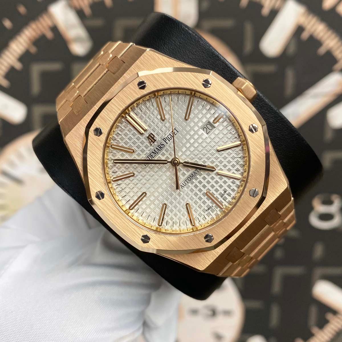 Audemars Piguet Royal Oak Selfwinding watch featuring a distinctive Gold "Grande Tapisserie" stainless steel bracelet.