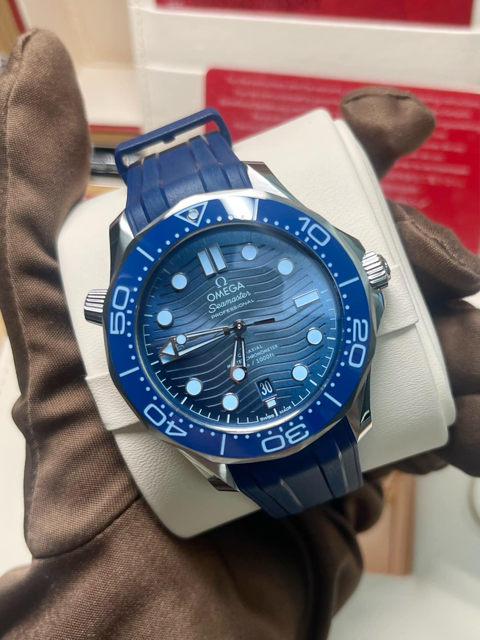 Omega Seamaster Diver 300M, specifically the 75th-anniversary "Summer Blue" edition featuring a distinctive wave-pattern dial