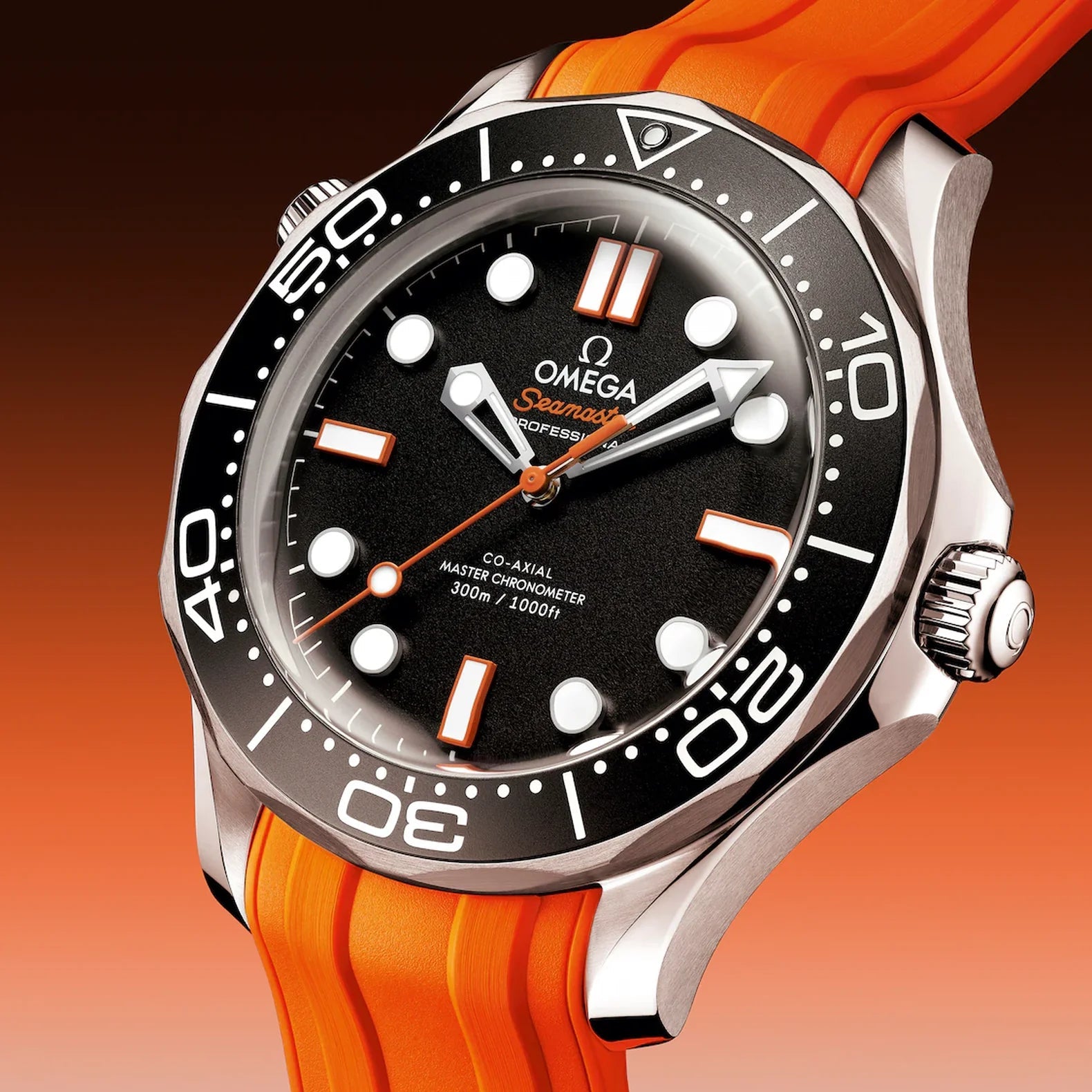 Omega Seamaster Diver 300M features a striking black matte dial paired with a vibrant orange rubber strap