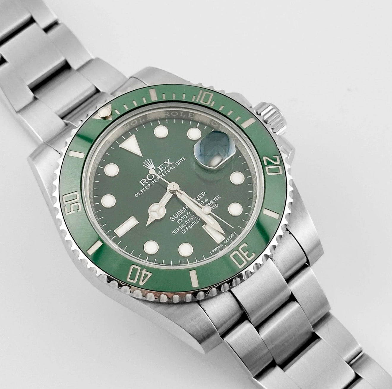 Rolex Submariner Date Hulk featuring a distinctive green dial and ceramic bezel