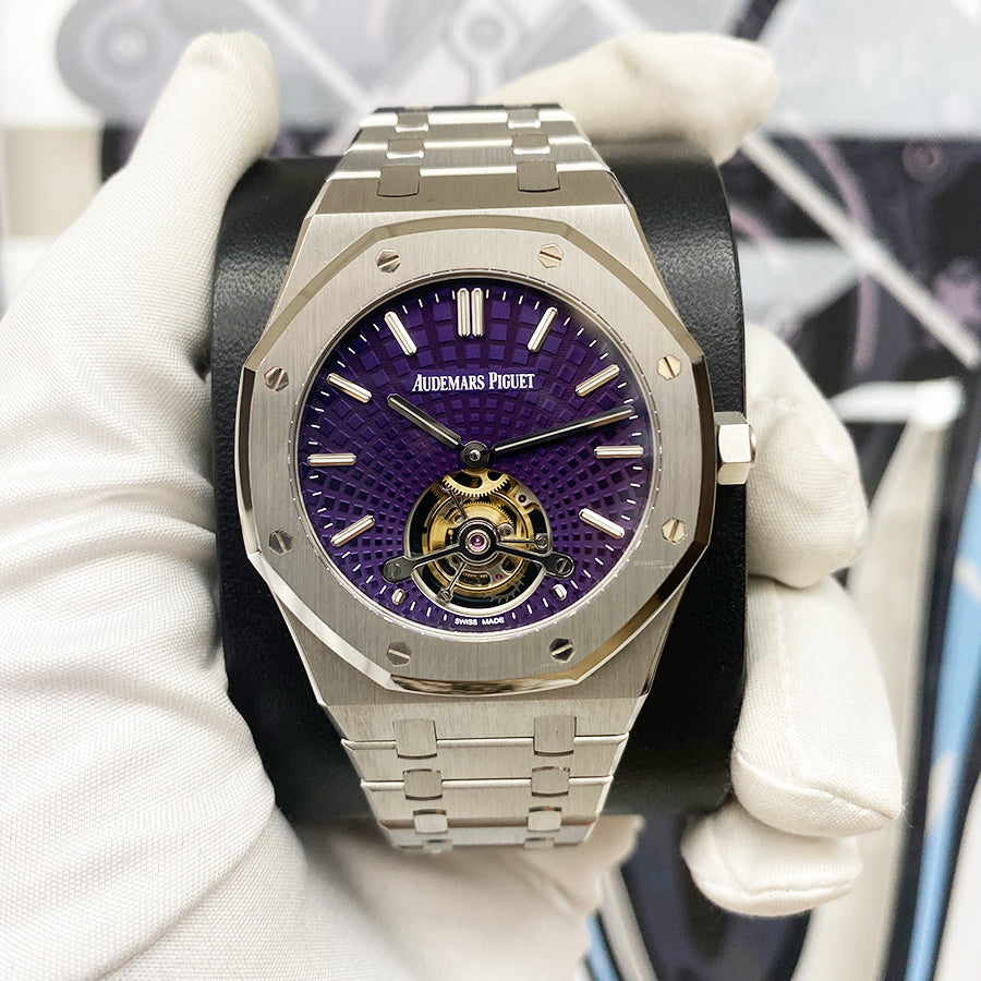 Audemars Piguet Royal Oak Tourbillon Extra-Thin features a unique purple dial with a "Tapisserie Evolutive" sunburst pattern.