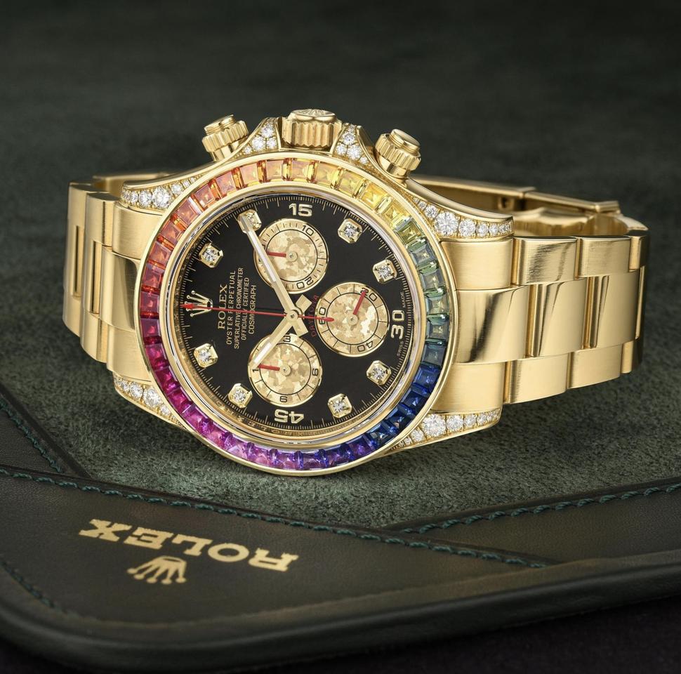 Rolex Daytona "Rainbow" 116598RBOW features a distinctive bezel set with multicolored sapphires