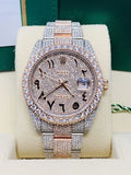 Rolex Datejust featuring a custom iced-out diamond dial with Arabic numerals and a full diamond-paved bezel and bracelet.