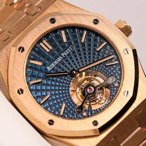 Audemars Piguet Royal Oak Tourbillon Extra-Thin featuring a rose gold case and a blue "Tapisserie" dial
