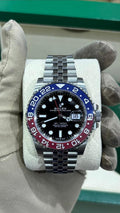 Rolex GMT-Master II, reference 126710BLRO, features the iconic red and blue "Pepsi" Cerachrom bezel and a stainless steel Jubilee bracelet