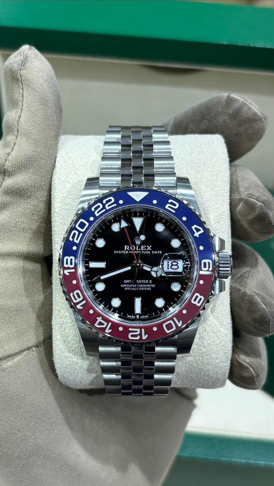 Rolex GMT-Master II, reference 126710BLRO, features the iconic red and blue "Pepsi" Cerachrom bezel and a stainless steel Jubilee bracelet
