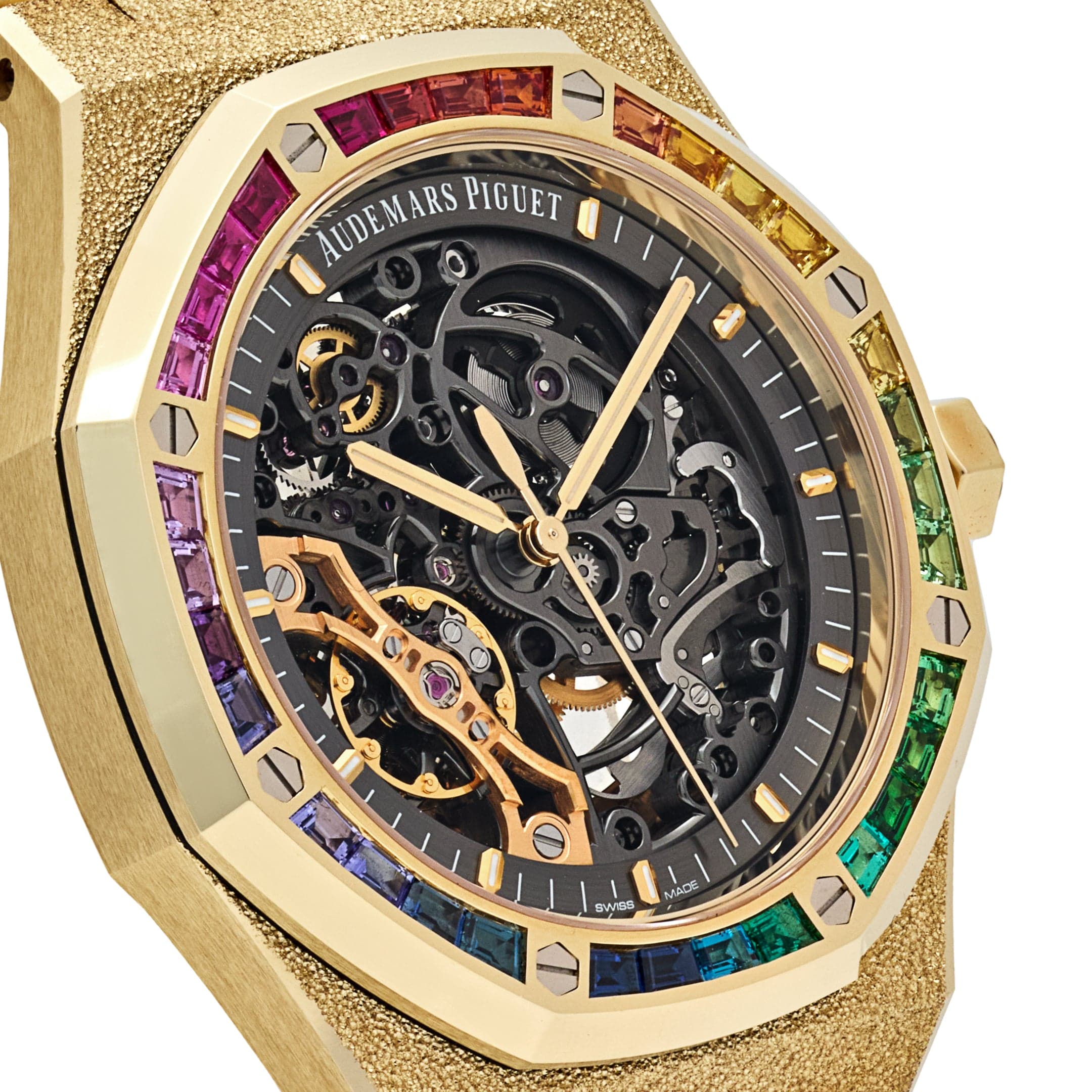 Audemars Piguet Royal Oak Double Balance Wheel Open-worked features a frosted yellow gold finish and a bezel set with rainbow-colored baguette-cut sapphires