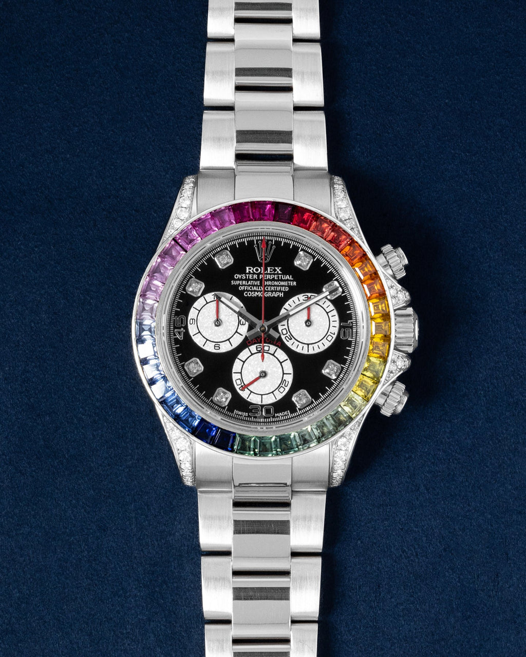 Rolex Cosmograph Daytona features a custom rainbow sapphire bezel and diamond-set lugs