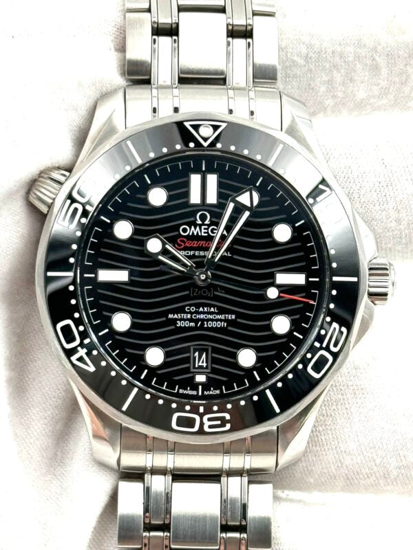 Omega Seamaster Diver 300M, distinguished by its black ceramic wave-patterned dial and stainless steel bracelet