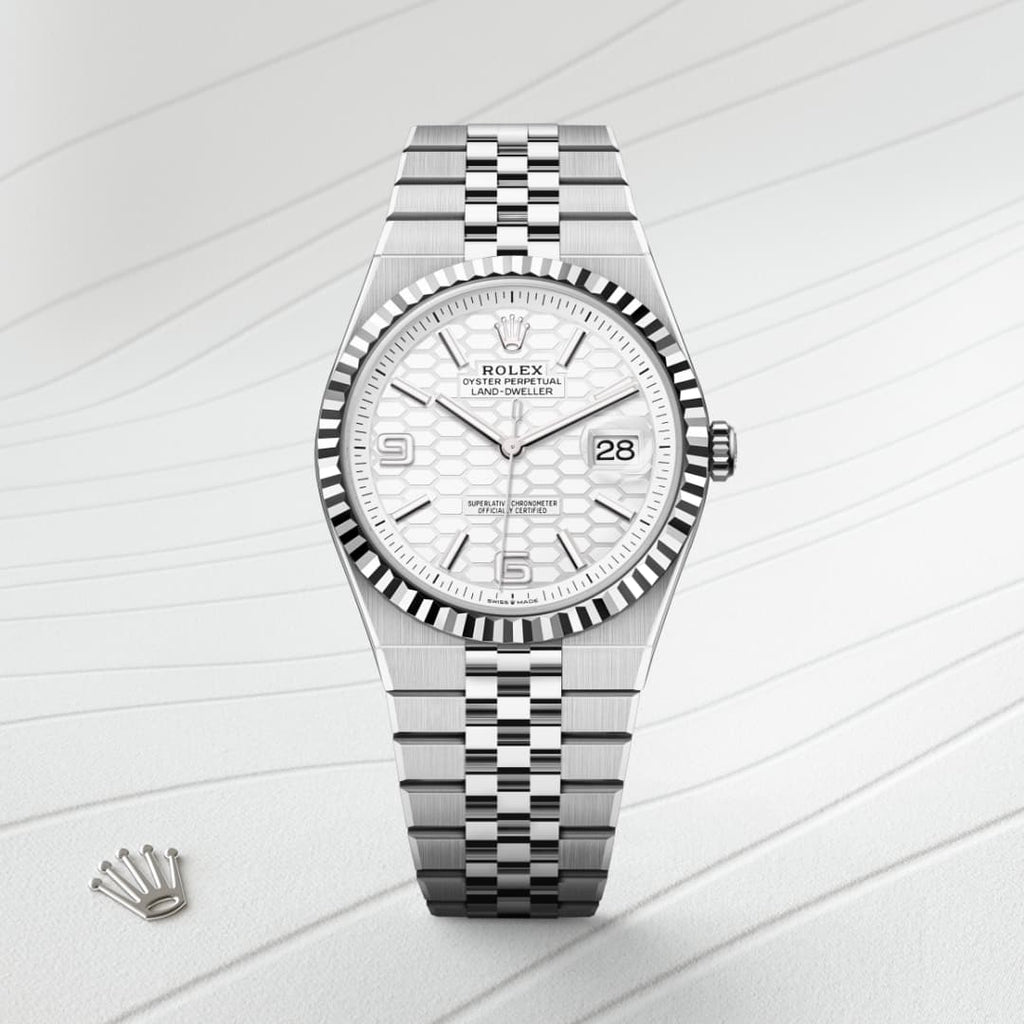 Rolex Land-Dweller features a distinctive white honeycomb motif dial and is paired with a stainless steel Jubilee bracelet