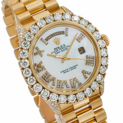 Rolex Day-Date 36mm features a white mother-of-pearl dial and a custom aftermarket diamond bezel