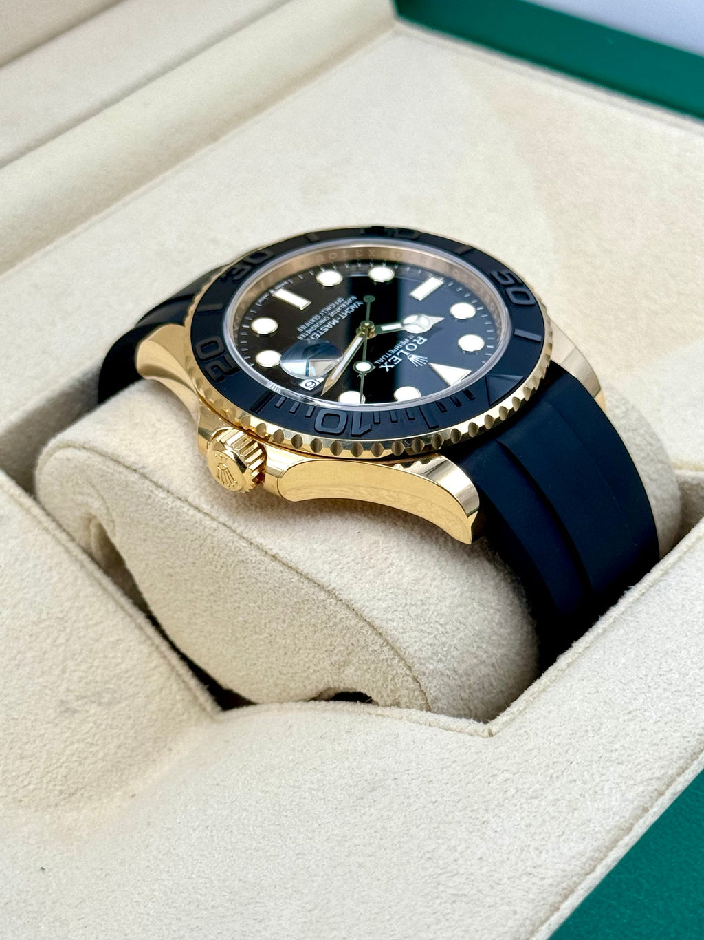 Rolex Yacht-Master features an yellow gold case paired with a black Oysterflex bracelet