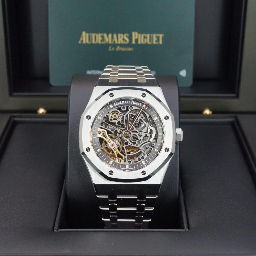 Audemars Piguet Royal Oak Openworked watch features a distinctive stainless steel octagonal bezel with visible screws and an intricate skeletonized dial.