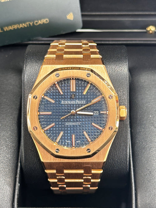 Audemars Piguet Royal Oak Selfwinding watch featuring a distinctive Gold "Grande Tapisserie" stainless steel bracelet.