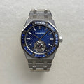 Audemars Piguet Royal Oak Tourbillon Extra-Thin features a platinum case and a bezel set with baguette-cut blue sapphires
