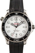 Omega Seamaster Diver 300M features a striking white ceramic dial with a distinctive wave pattern and a durable black rubber strap