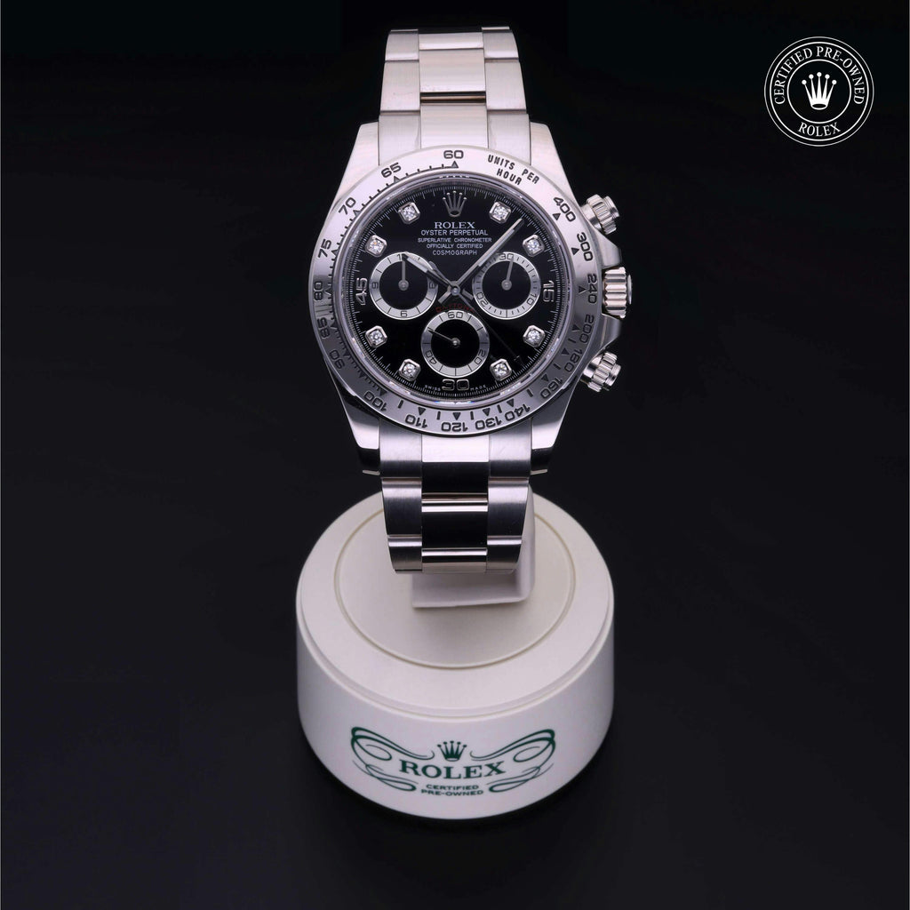 Rolex Daytona 116509, featuring a white gold case and a black dial adorned with diamond hour markers