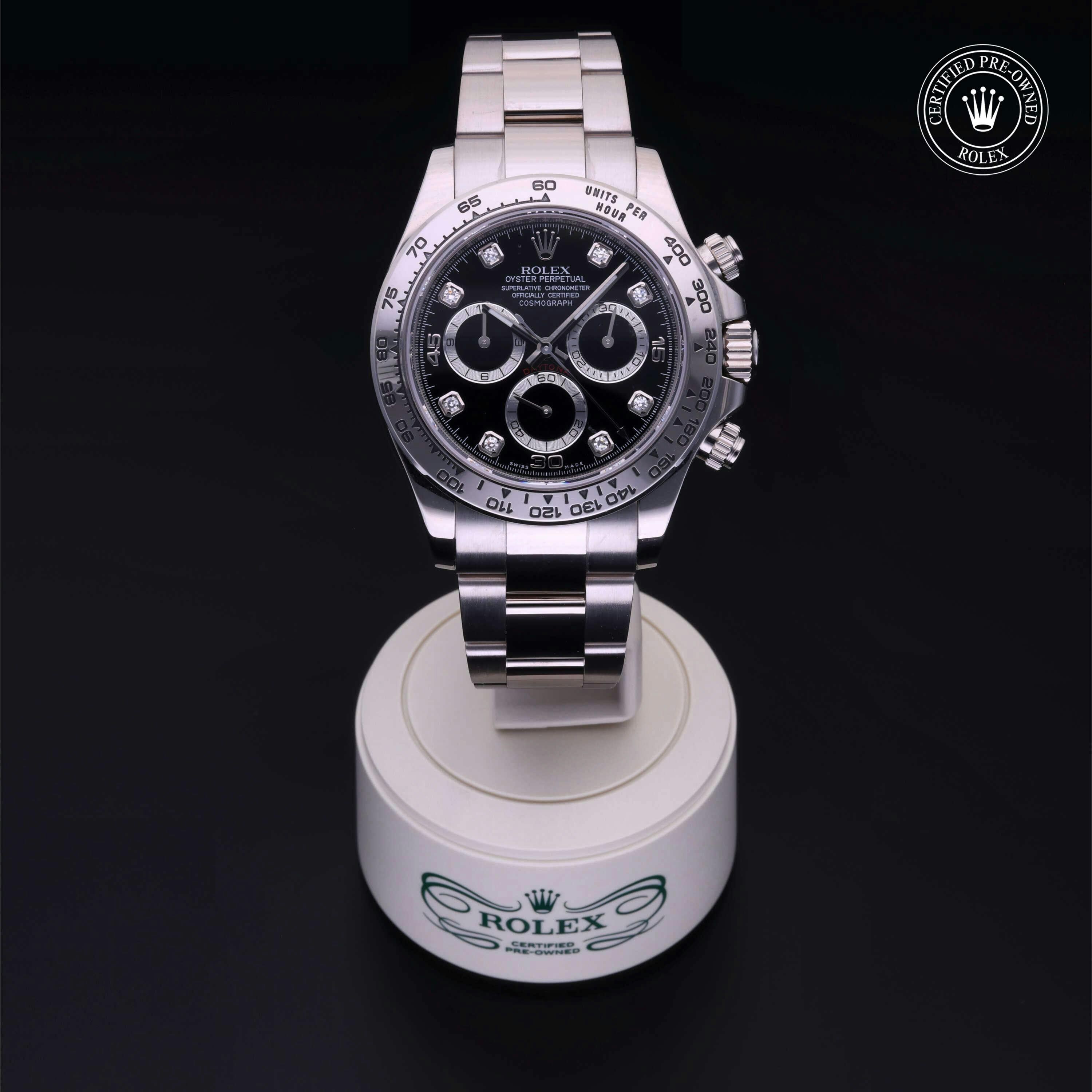 Rolex Daytona 116509, featuring a white gold case and a black dial adorned with diamond hour markers