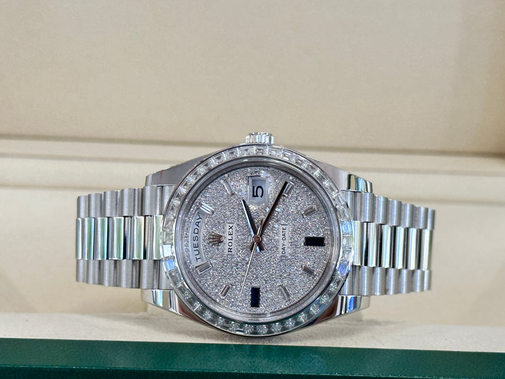 Rolex Day-Date 40 wristwatch, specifically reference 228396TBR, features a platinum case and a diamond-paved dial