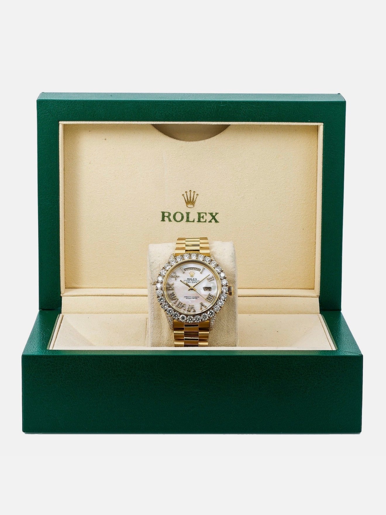 Rolex Day-Date 36mm features a white mother-of-pearl dial and a custom aftermarket diamond bezel