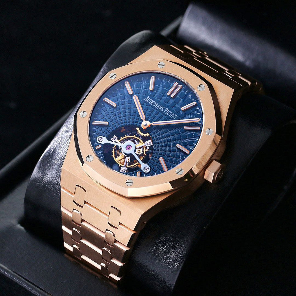 Audemars Piguet Royal Oak Tourbillon Extra-Thin featuring a rose gold case and a blue "Tapisserie" dial