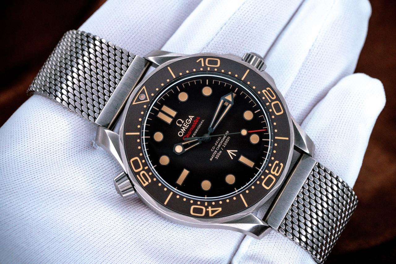 Omega Seamaster Diver 300M 007 Edition crafted from lightweight Grade 2 Titanium with a mesh bracelet.