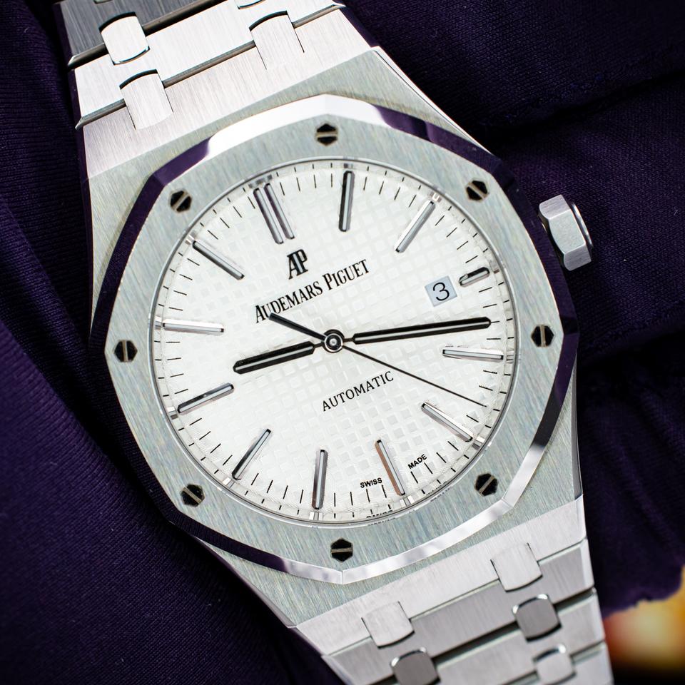 Audemars Piguet Royal Oak Selfwinding watch featuring a distinctive silver "Grande Tapisserie" stainless steel bracelet.