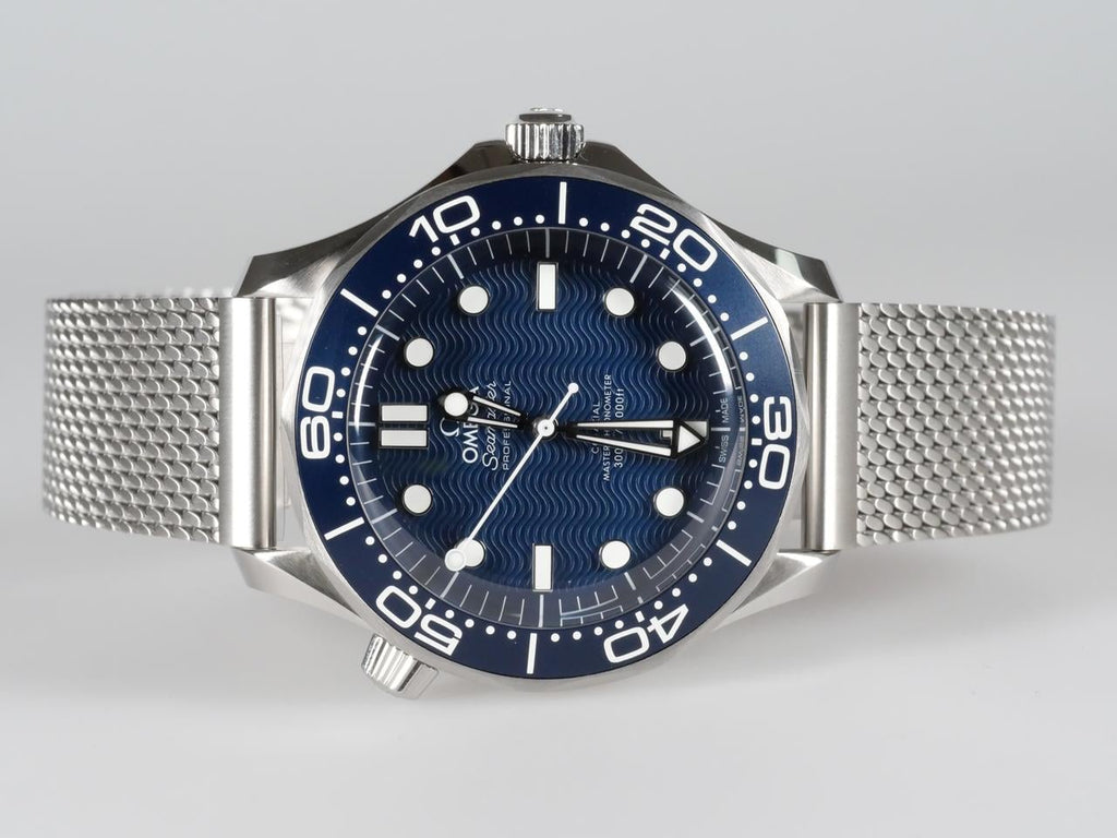 Omega Seamaster Diver 300M James Bond 60th Anniversary Watch with a laser-engraved blue wave dial