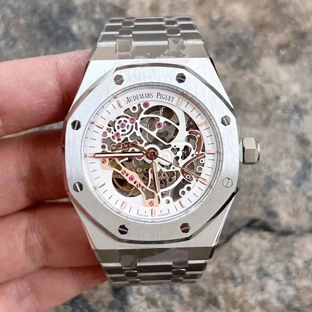 Audemars Piguet Royal Oak Openworked watch features a distinctive stainless steel octagonal bezel with visible screws and an intricate skeletonized dial.