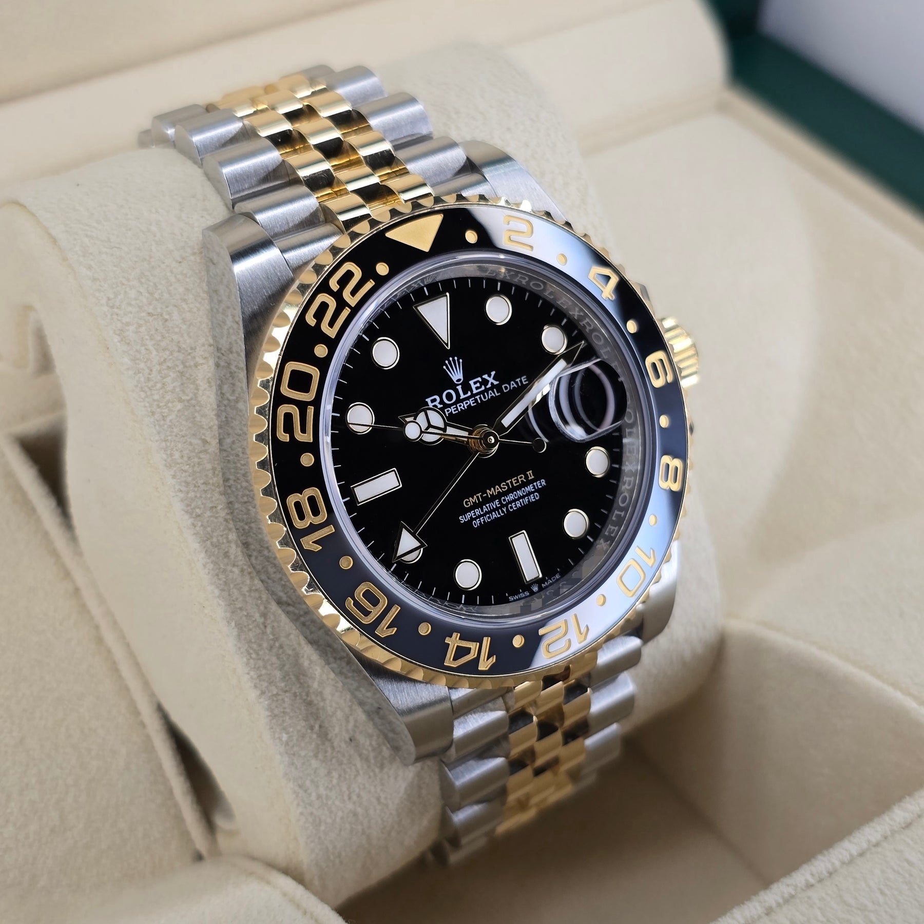 Rolex GMT-Master II in Oystersteel and yellow gold, featuring a black lacquered dial and a two-tone Jubilee bracelet