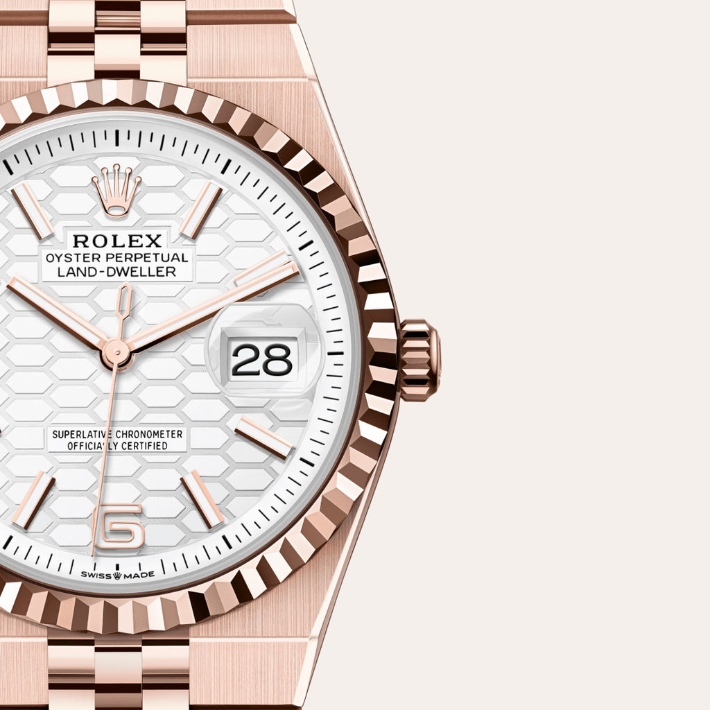 Rolex Land-Dweller watch features an Eve-rose gold case and a unique white honeycomb-motif dial.