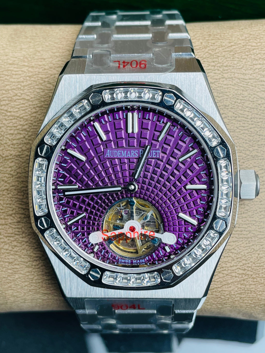Audemars Piguet Royal Oak Selfwinding Flying Tourbillon features a purple "Plum" dial with a distinct sunburst tapisserie pattern.