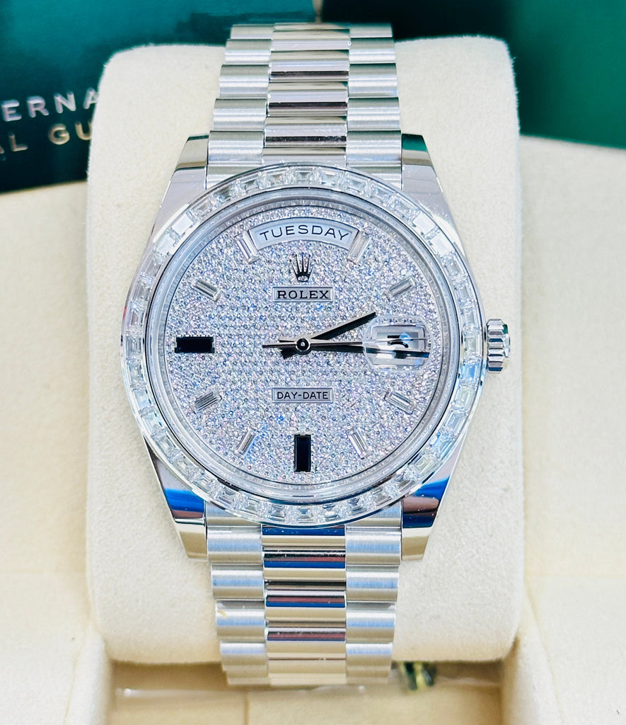 Rolex Day-Date 40 wristwatch, specifically reference 228396TBR, features a platinum case and a diamond-paved dial