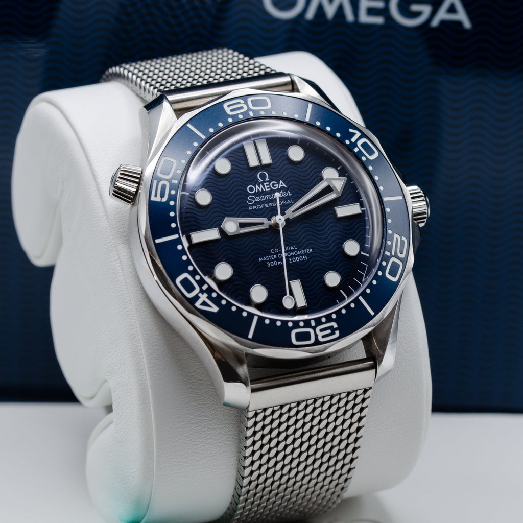 Omega Seamaster Diver 300M James Bond 60th Anniversary Watch with a laser-engraved blue wave dial