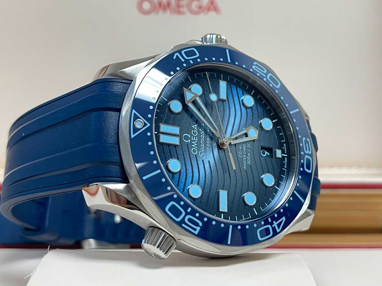 Omega Seamaster Diver 300M, specifically the 75th-anniversary "Summer Blue" edition featuring a distinctive wave-pattern dial