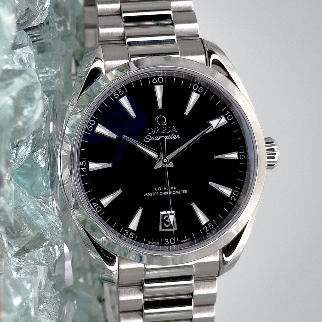 Omega Seamaster Aqua Terra 150M features a stainless steel case and a glossy black lacquered dial.