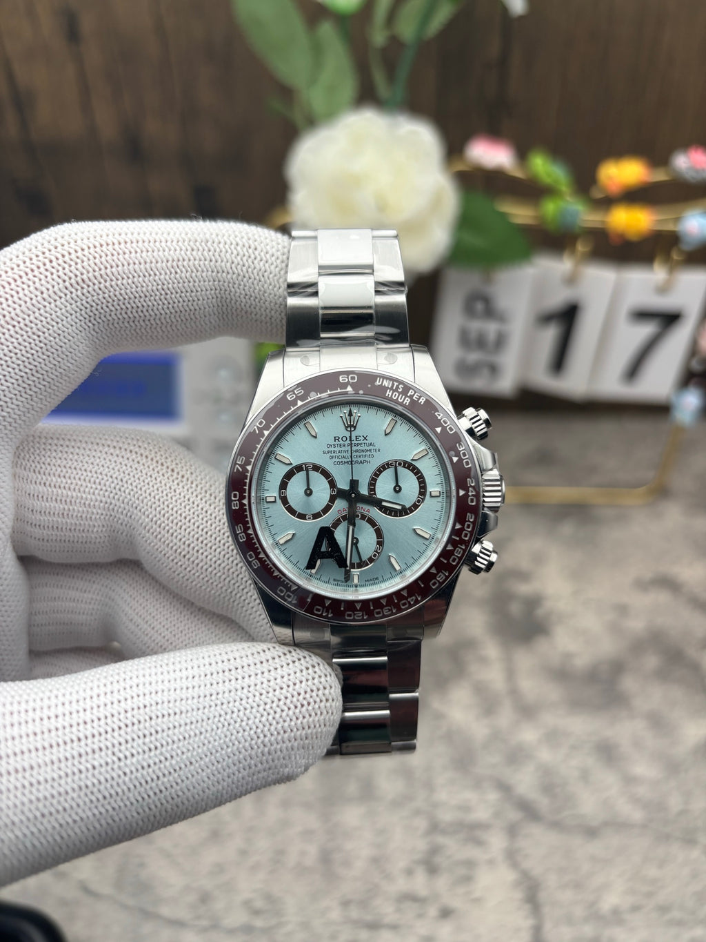 Rolex Cosmograph Daytona platinum a distinct ice blue dial with a chestnut brown bezel. unique exhibition caseback that showcases the every movement