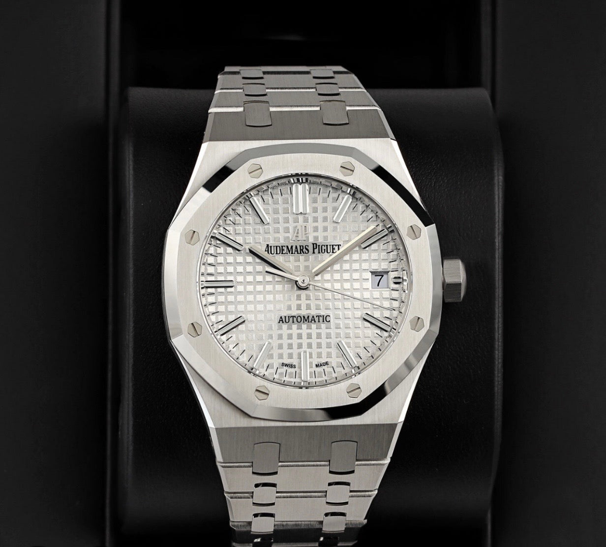 Audemars Piguet Royal Oak Selfwinding watch featuring a distinctive silver "Grande Tapisserie" stainless steel bracelet.