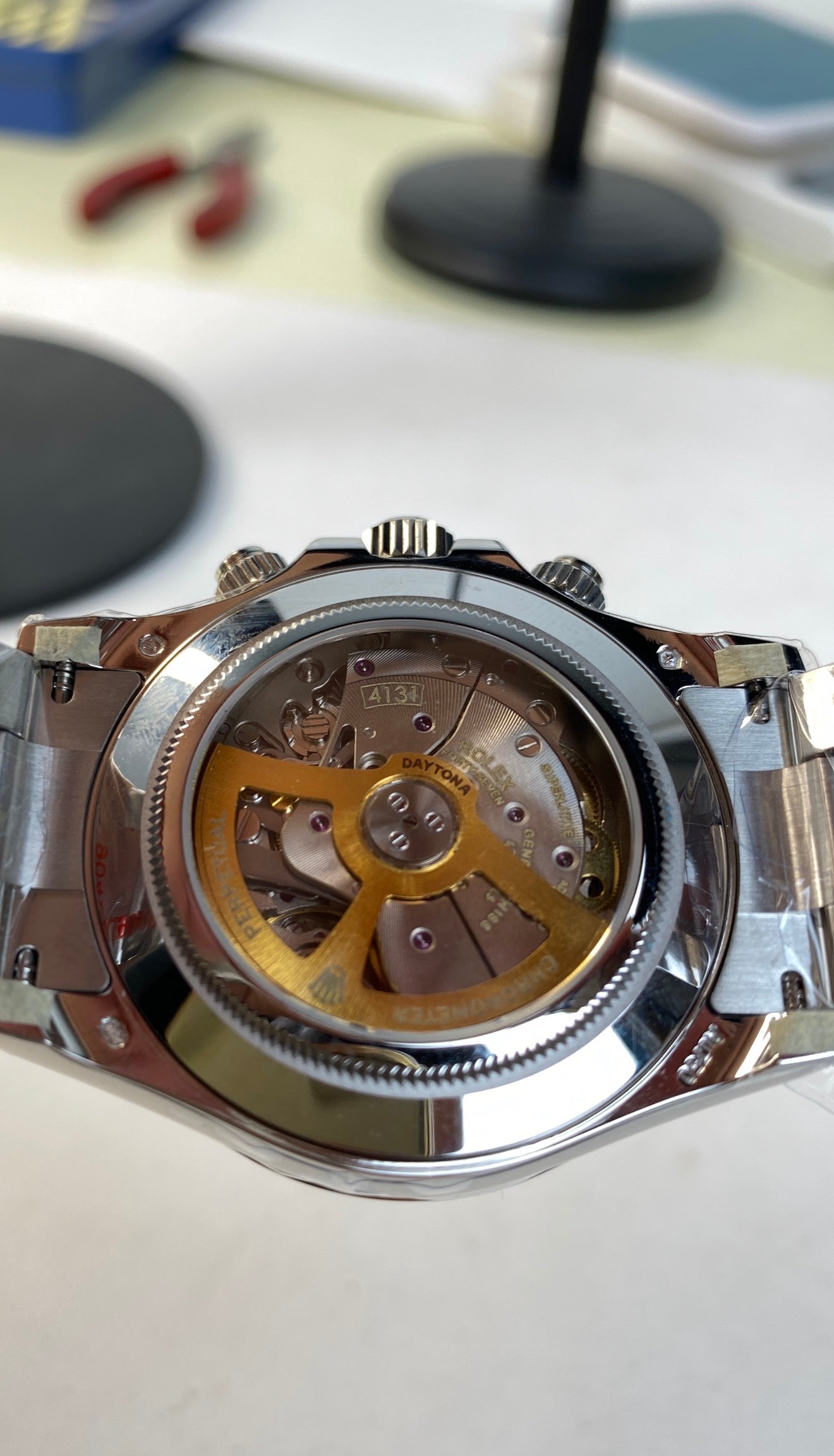 Rolex Cosmograph Daytona featuring a distinct ice blue dial with a chestnut brown bezel