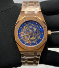Audemars Piguet Royal Oak Openworked watch features a distinctive gold stainless steel octagonal bezel with visible screws and an intricate skeletonized dial.