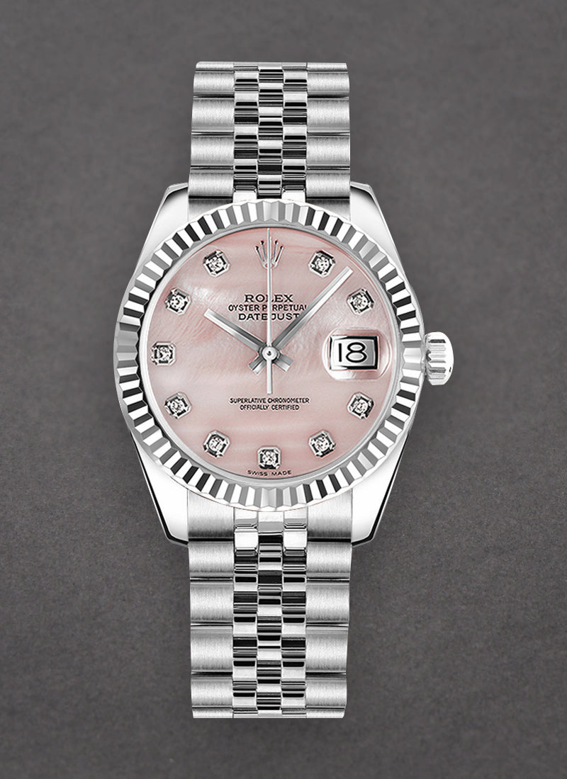 Rolex Datejust 31 features a pink dial with diamond hour markers and a fluted white gold bezel