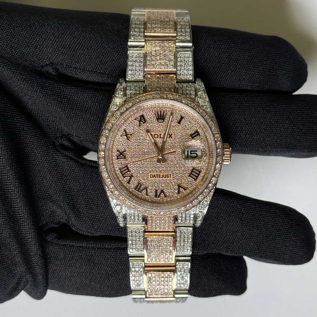 Rolex Datejust featuring a custom iced-out diamond dial with Arabic numerals and a full diamond-paved bezel and bracelet.