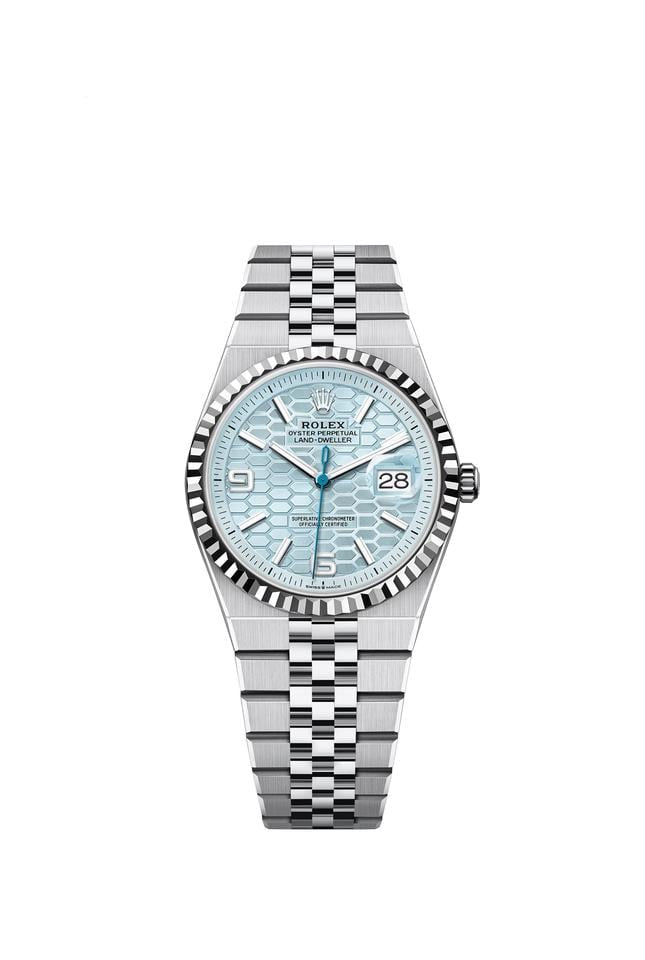 Rolex Land-Dweller watch features a platinum case and an blue dial with a honeycomb motif
