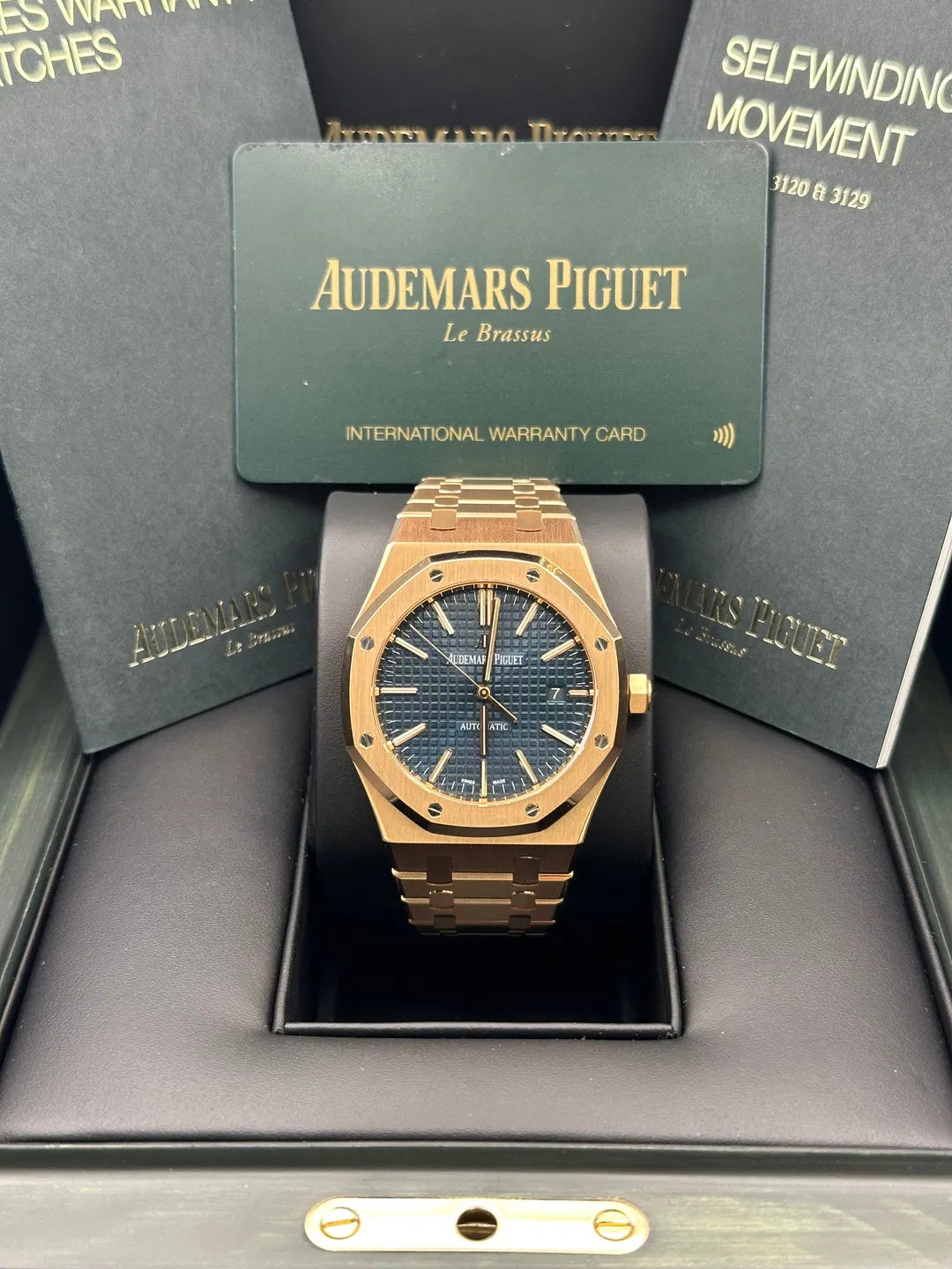 Audemars Piguet Royal Oak Selfwinding watch featuring a distinctive Rose Gold "Grande Tapisserie" stainless steel bracelet.