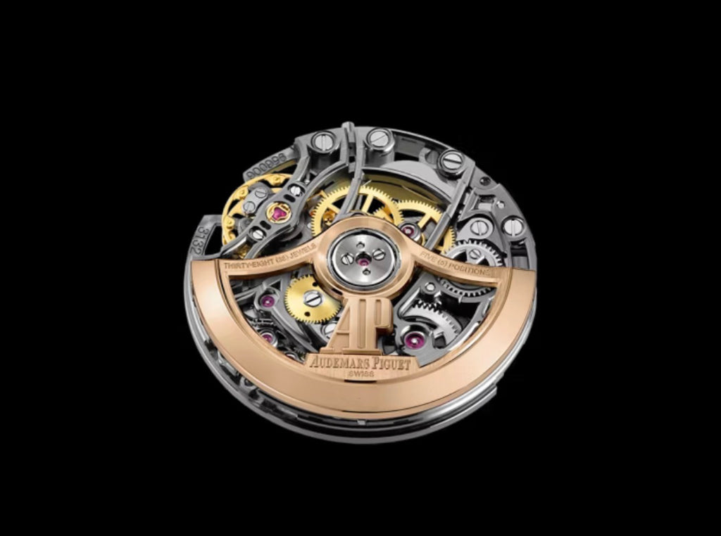 Audemars Piguet Royal Oak Openworked watch features a distinctive gold stainless steel octagonal bezel with visible screws and an intricate skeletonized dial.